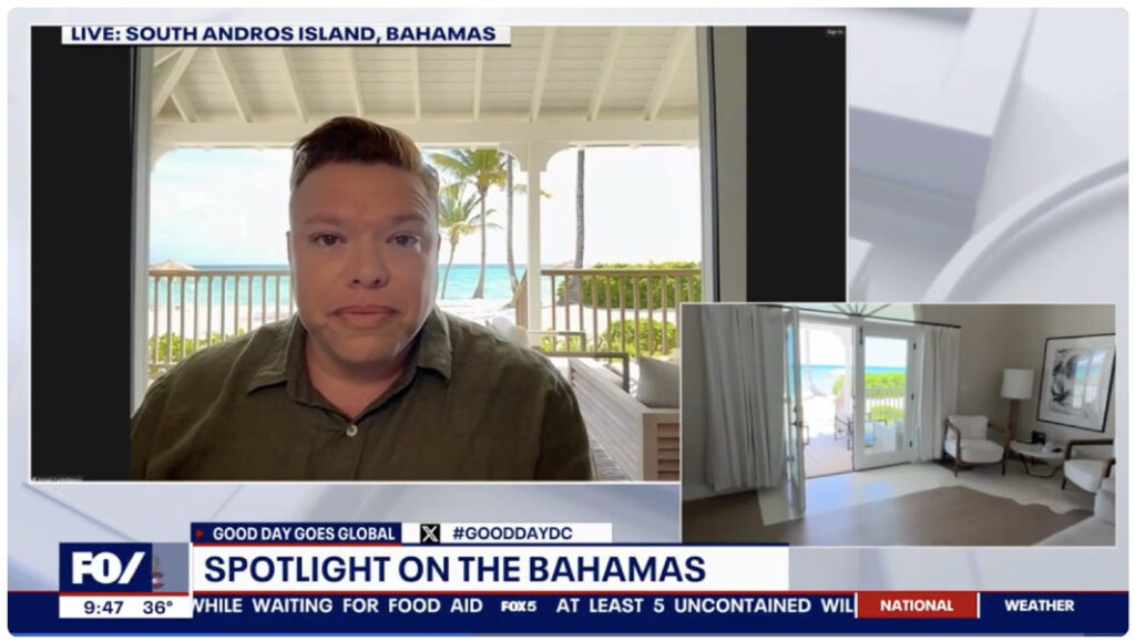 Video interview with beach and white porch backdrop at Caerula Mar Club, inset of luxury oceanview suite. Fox 5: Spotlight on the Bahamas.