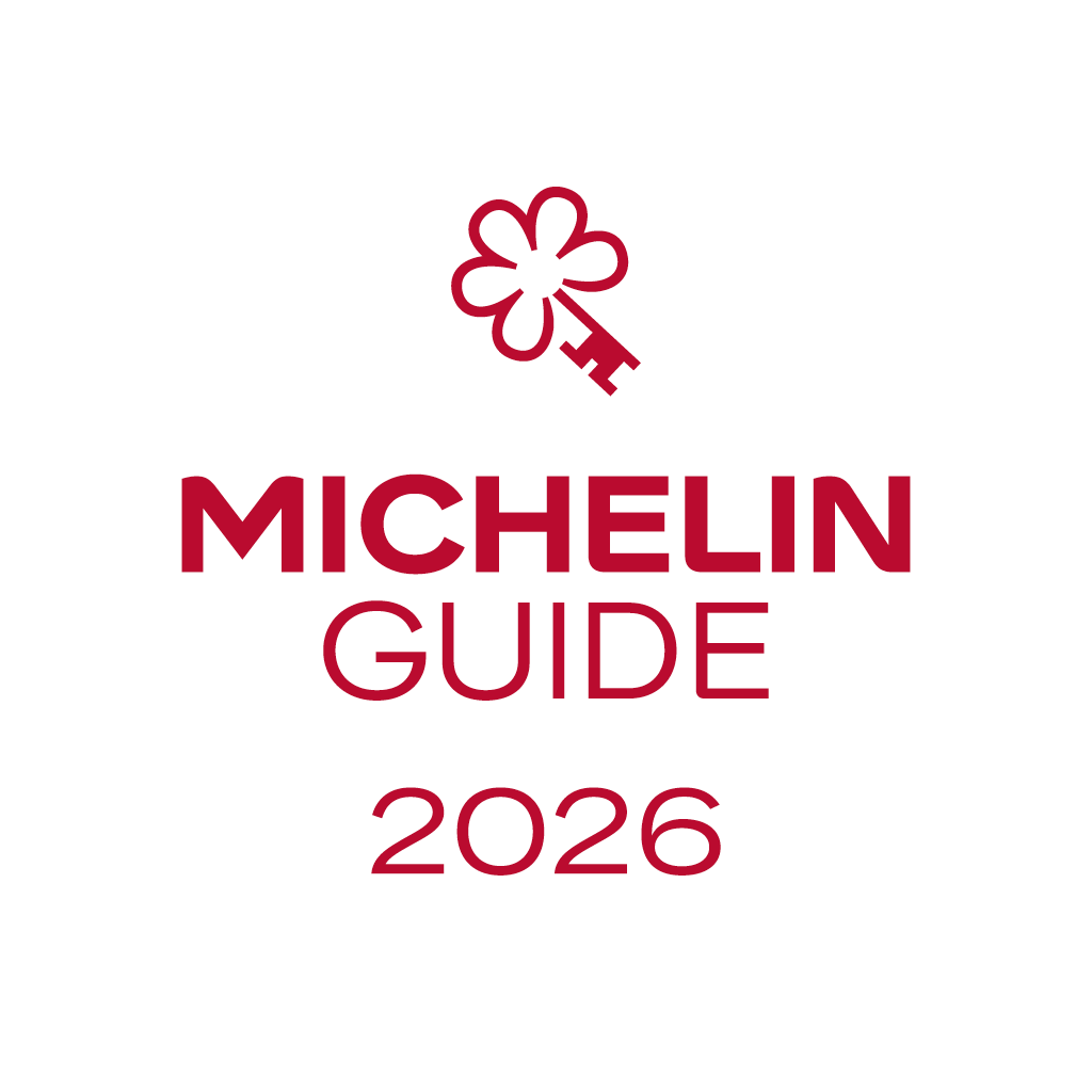 Red Michelin Guide logo featuring a key and flower above “MICHELIN GUIDE 2026” on a white background with rounded corners, in an elegant, welcoming design. All resort photos are from Caerula Mar Club, a luxury boutique resort on South Andros Island in The Bahamas.